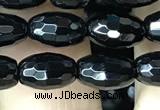 CAA2498 15.5 inches 6*9mm faceted rice black agate beads wholesale