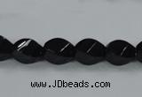 CAB335 15.5 inches 8*12mm faceted & twisted rice black agate beads