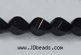 CAB336 15.5 inches 10*14mm faceted & twisted rice black agate beads