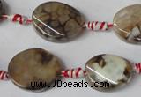 CAG1576 15.5 inches 15*20mm twisted oval fire crackle agate beads