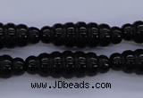 CAG1695 15.5 inches 10*30mm carved rice black agate beads