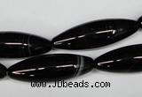 CAG2969 15.5 inches 10*30mm rice black line agate beads