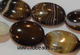 CAG3496 15.5 inches 18*25mm oval brown line agate beads