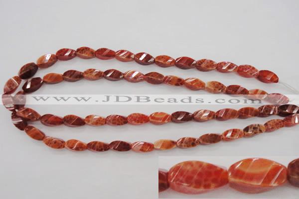 CAG4181 15.5 inches 7*14mm faceted & twisted rice natural fire agate beads