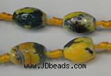 CAG5774 15 inches 10*14mm faceted rice fire crackle agate beads