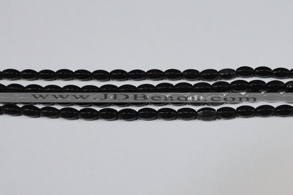 CAG6029 15.5 inches 6*10mm faceted rice matte black agate beads