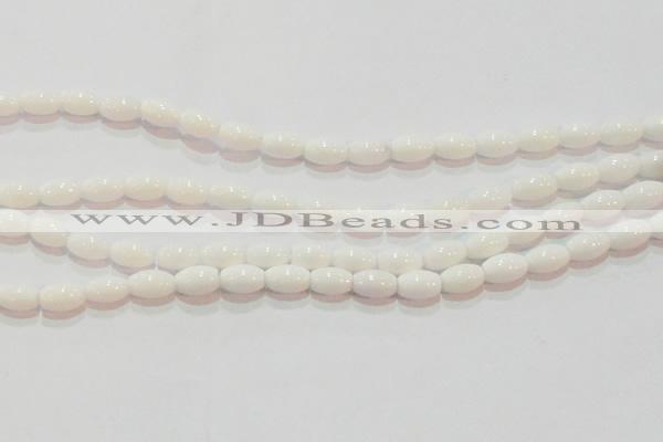 CAG7201 15.5 inches 6*9mm rice white agate gemstone beads