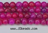 CAG9924 15.5 inches 4mm round fuchsia crazy lace agate beads