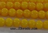 CAR401 15.5 inches 6mm round synthetic amber beads wholesale