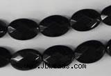 CBS310 15.5 inches 10*14mm faceted oval blackstone beads wholesale