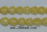 CCA11 15.5 inches 10*10mm heart yellow calcite gemstone beads