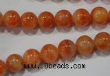 CCA303 15.5 inches 10mm round orange calcite gemstone beads wholesale