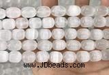 CCA380 15.5 inches 10*12mm rice white calcite gemstone beads