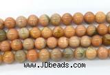 CCA554 15.5 inches 12mm round peach calcite gemstone beads