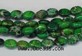 CDI178 15.5 inches 6*8mm oval dyed imperial jasper beads