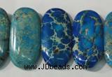 CDT917 15.5 inches 15*30mm oval double drilled dyed aqua terra jasper beads