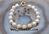 CFB1043 Hand-knotted 9mm - 10mm potato white freshwater pearl & white fossil jasper bracelet