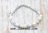 CFB702 faceted rondelle white howlite & potato white freshwater pearl stretchy bracelet