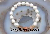 CFB913 9mm - 10mm rice white freshwater pearl & rainbow moonstone stretchy bracelet