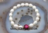 CFB916 9mm - 10mm rice white freshwater pearl & red tiger eye stretchy bracelet