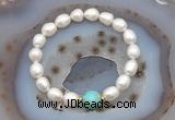 CFB926 9mm - 10mm rice white freshwater pearl & blue sea sediment jasper stretchy bracelet