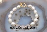 CFB934 Hand-knotted 9mm - 10mm rice white freshwater pearl & rose quartz bracelet