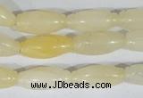 CFG552 15.5 inches 8*20mm carved rice yellow aventurine beads