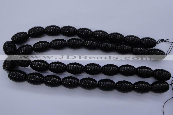 CFG759 15.5 inches 15*20mm carved rice black agate beads