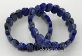 CGB3279 7.5 inches 10*15mm faceted oval lapis lazuli bracelets