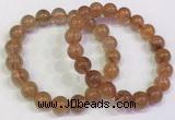 CGB4614 10mm - 11mm round golden rutilated quartz beaded bracelets