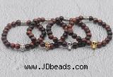 CGB6015 8mm round red tiger eye bracelet with skull for men