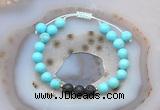 CGB6586 8mm round blue howlite & black lava adjustable bracelets