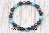 CGB8379 8mm blue howlite, black onyx & hematite energy bracelet