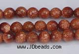 CGS470 15.5 inches 4mm faceted round goldstone beads wholesale