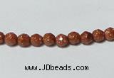 CGS88 15.5 inches 4mm faceted round goldstone beads wholesale