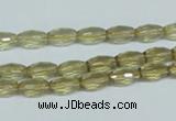 CLQ10 15.5 inches 6*10mm faceted rice natural lemon quartz beads