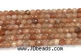 CMS2258 15 inches 6mm faceted round orange moonstone beads