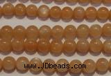 CMS701 15.5 inches 6mm round peach moonstone beads wholesale