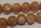 CMS704 15.5 inches 12mm round peach moonstone beads wholesale