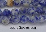 CNG6250 15.5 inches 6mm faceted nuggets blue spot stone beads