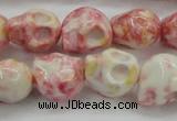 CRF358 15.5 inches 11*12mm skull dyed rain flower stone beads