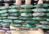 CRI148 15.5 inches 10*30mm faceted rice ruby zoisite beads