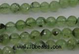 CRU152 15.5 inches 8mm faceted round green rutilated quartz beads