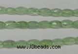 CRU165 15.5 inches 5*8mm faceted rice green rutilated quartz beads