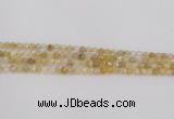 CRU666 15.5 inches 4mm faceted round golden rutilated quartz beads