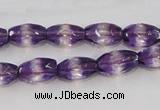 CSA25 15.5 inches 7*12mm faceted rice synthetic amethyst beads