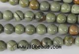 CSL102 15.5 inches 8mm round silver leaf jasper beads wholesale