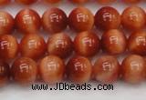 CTE1661 15.5 inches 6mm round sun orange tiger eye beads