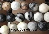 CTG3563 15.5 inches 4mm faceted round black picasso jasper beads