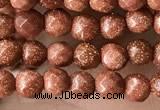 CTG3590 15.5 inches 4mm faceted round goldstone beads wholesale